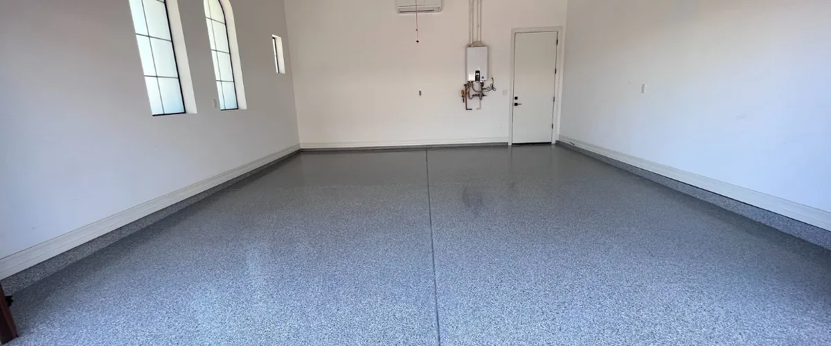 Garage floor with light gray flake epoxy coating