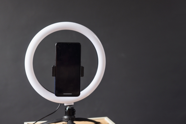 Smartphone on ringlight for tiktok recording