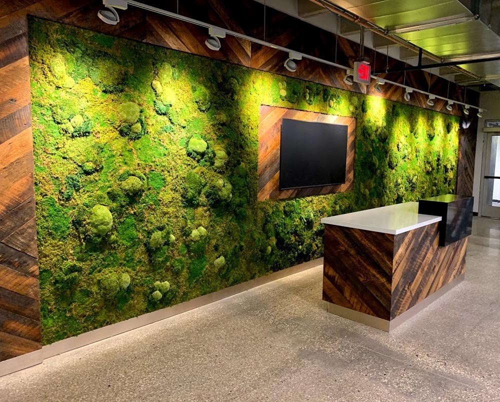 Mixed texture moss mural with vibrant green and earthy tones