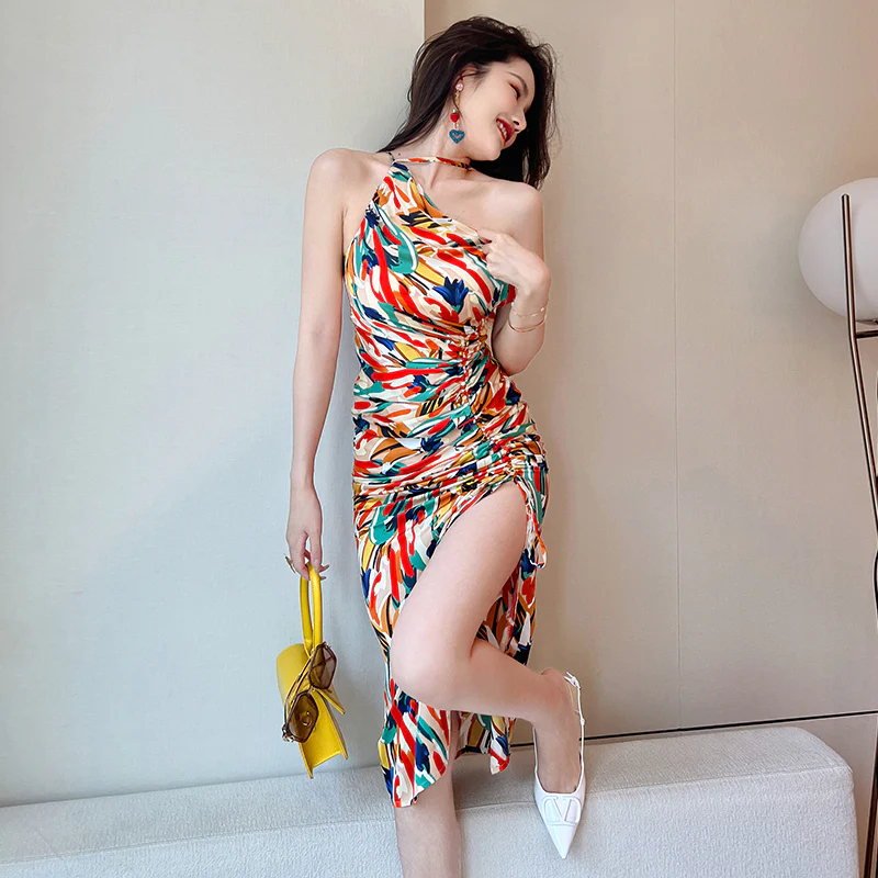 woman in bright dress smiling