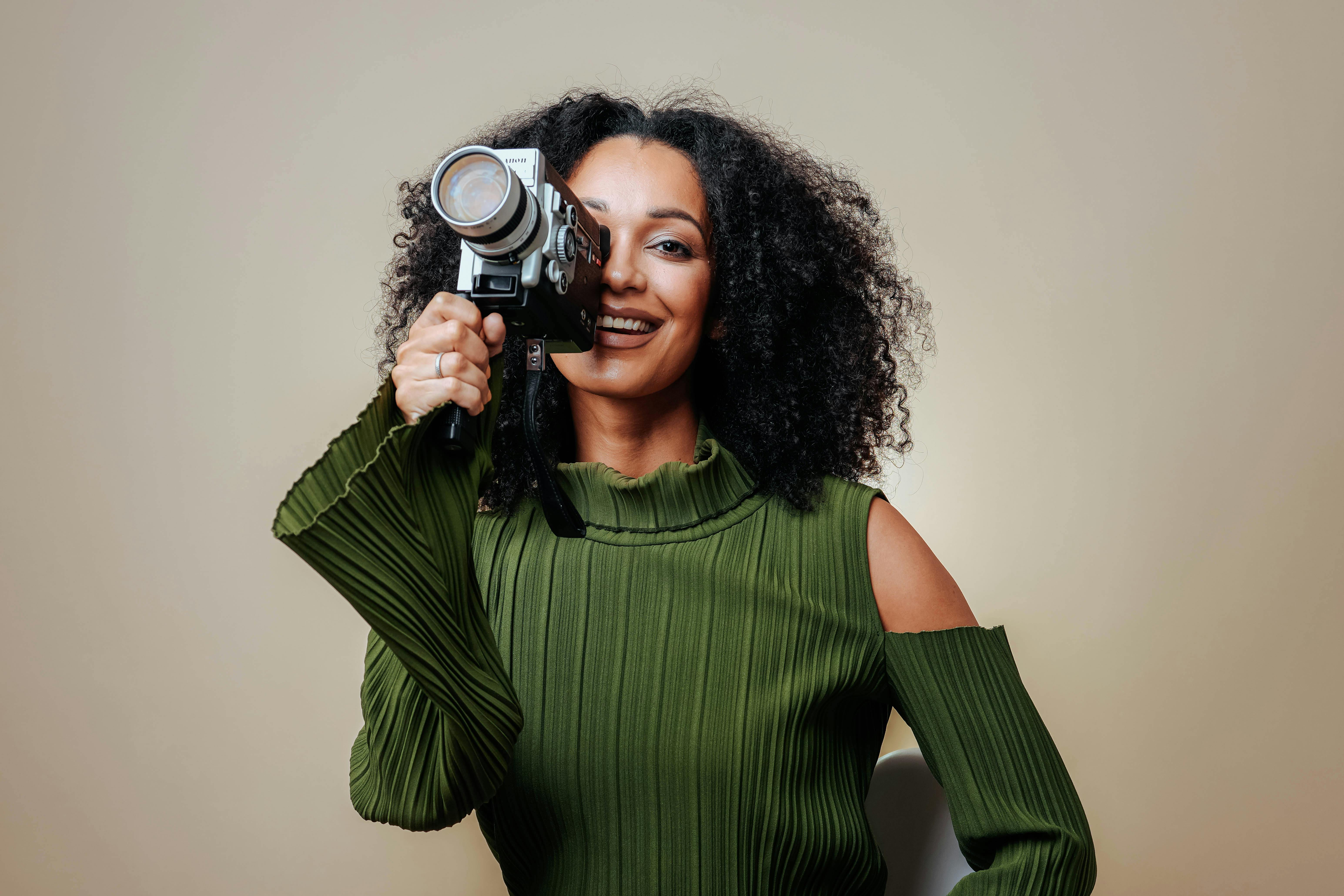 woman holding Super 8 camera