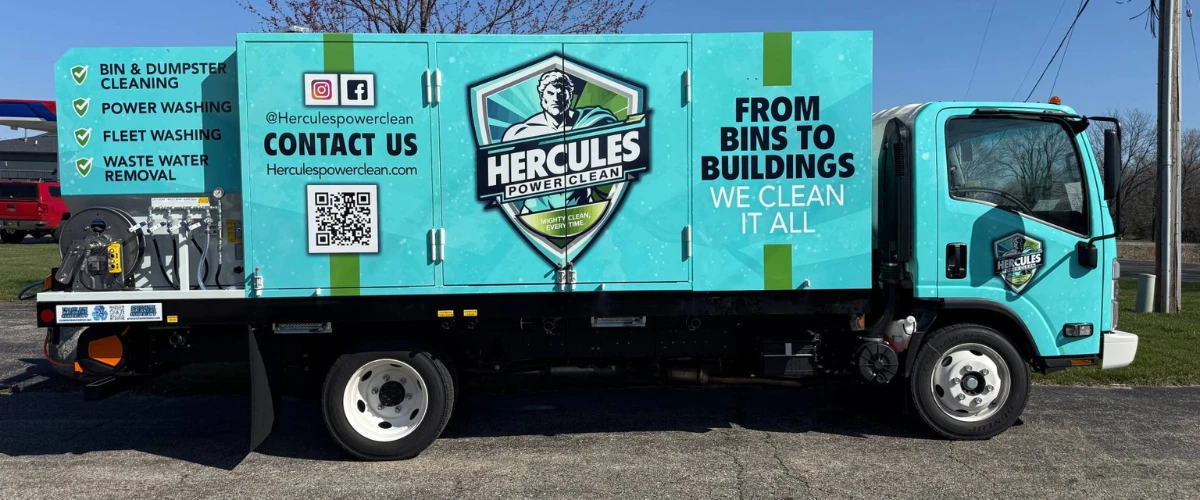 Side view of Hercules Power Clean truck featuring branding for bin cleaning, power washing, and fleet washing services.