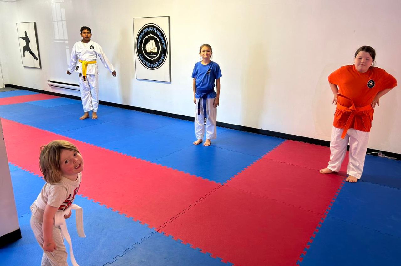 Martial arts instructor with kids