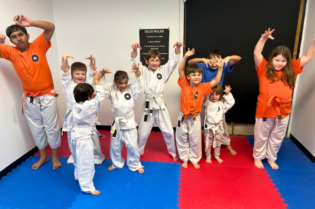Martial arts instructor with kids