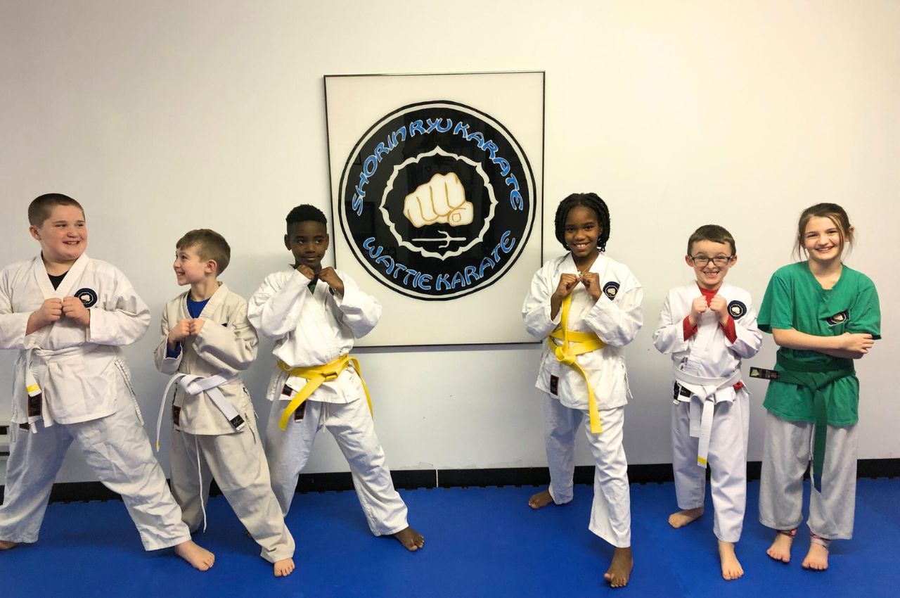 Martial arts instructor with kids