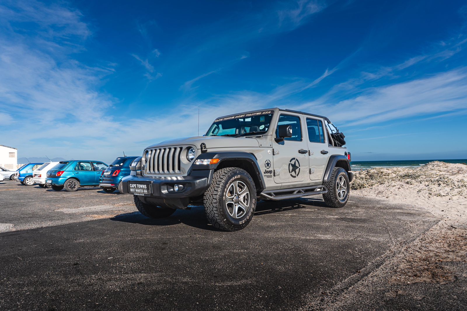 2024 Jeep Rubicon 4x4 parked on an off-road trail