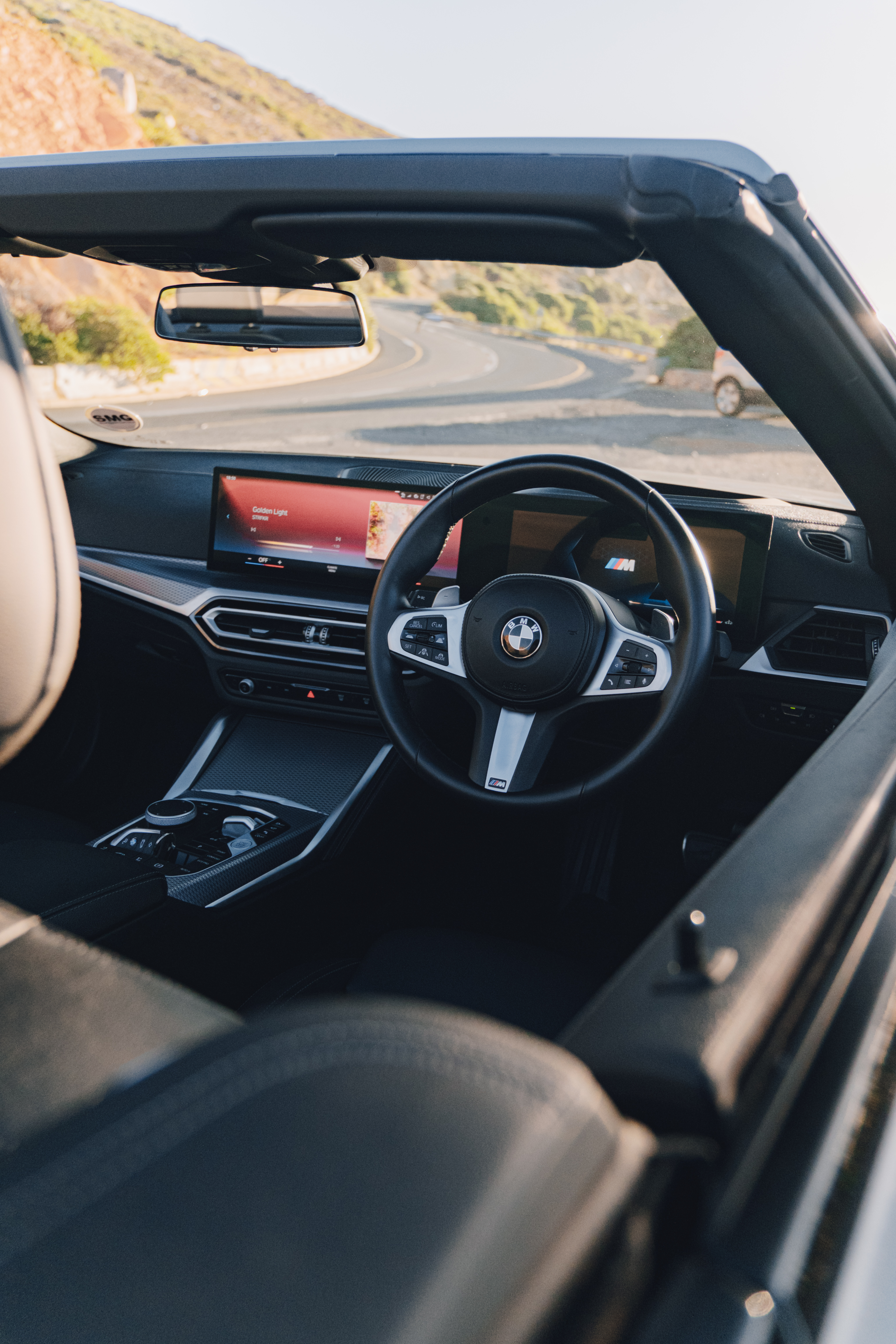 Silver 2024 BMW M440i xDrive Convertible premium hire photo.