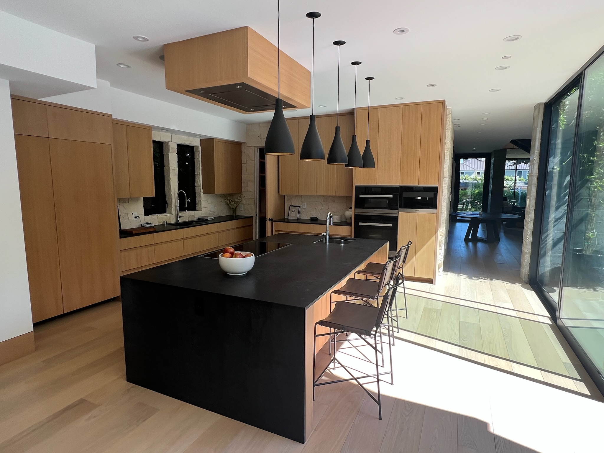 Modern kitchen remodel in Newbury Park, CA with custom cabinetry and updated countertops by Boaz Construction.
