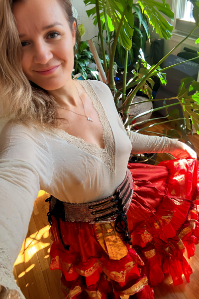 Emma in a red skirt taking a selfie Emma in a red skirt taking a selfie