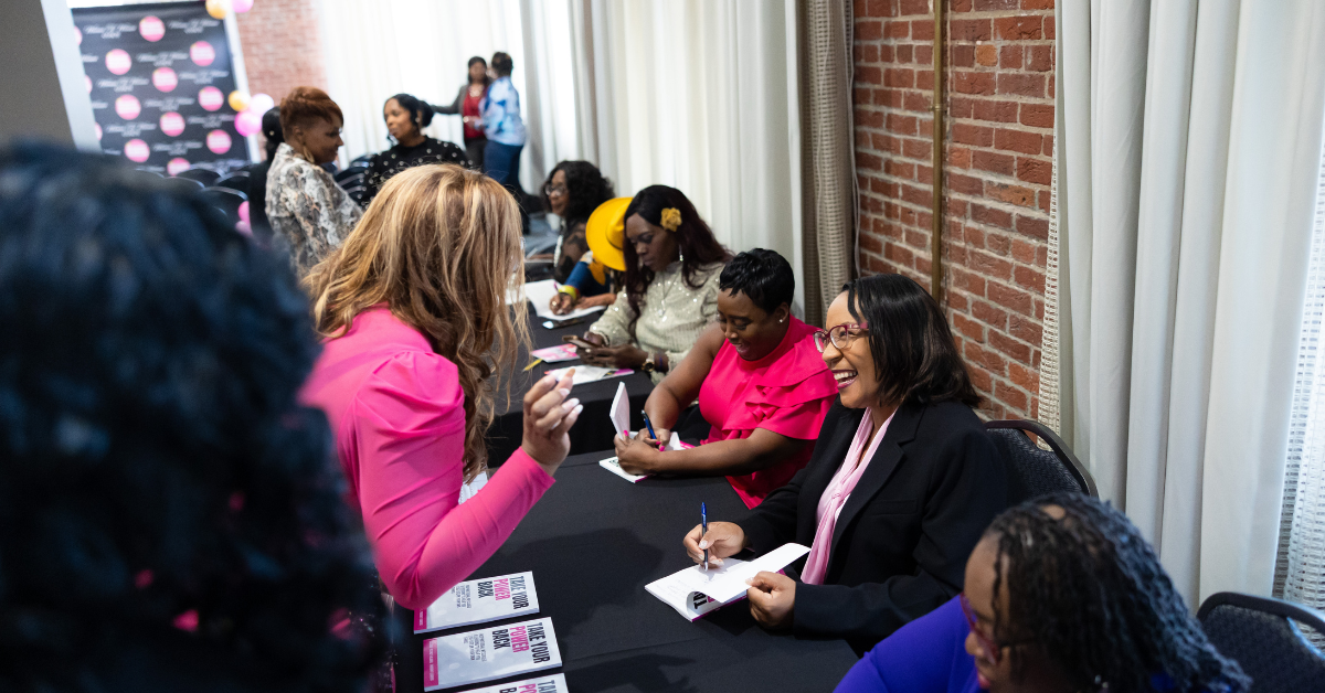 A successful book signing at Woman To Woman Conference.