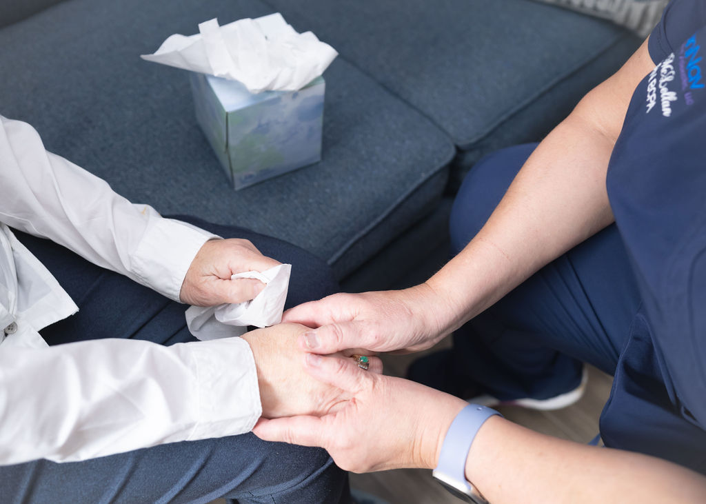 Mental Health Help, nurse holding hand of patient with tissues, mental health support