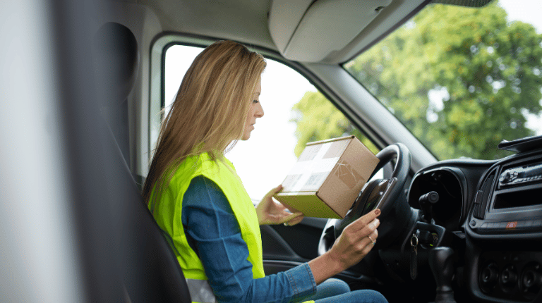 Woman in Yellow Shirt and Blue Denim Jeans Sitting on Drivers Seat Reading Book Woman in Yellow Shirt and Blue Denim Jeans Sitting on Drivers Seat Reading Book