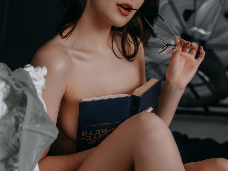 Woman reading erotica