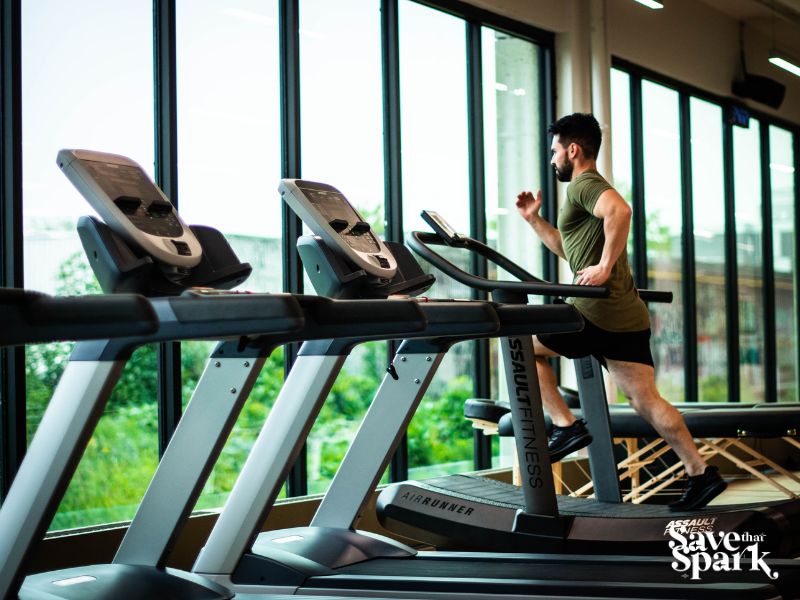 Man running on treadmill at the gym