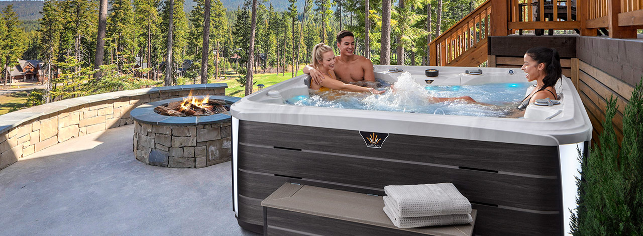 A group of friends enjoying an afternoon in their marquis spa A group of friends enjoying an afternoon in their marquis spa