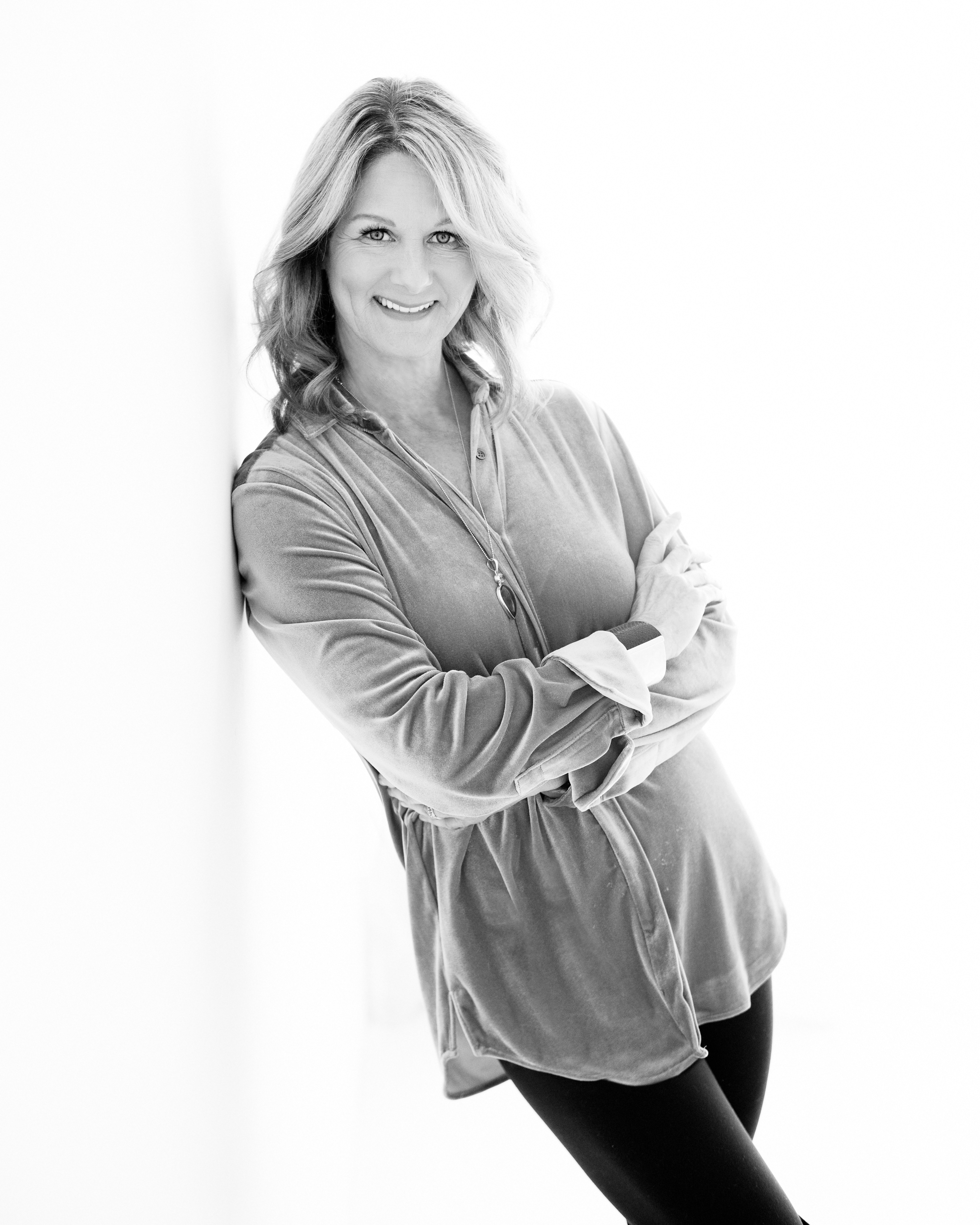 Jill Perin smiling gently in a peaceful setting