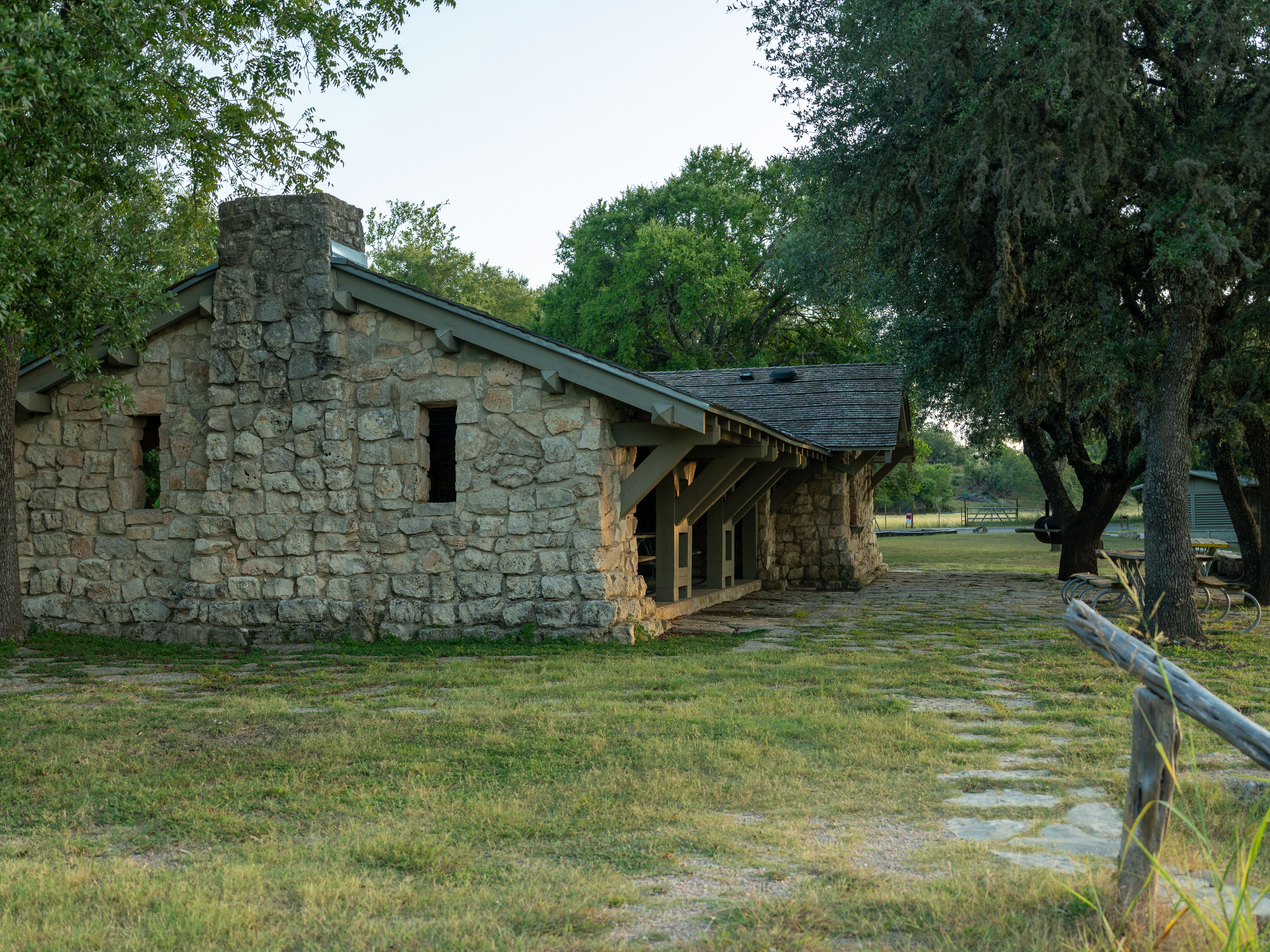 Rustic stone pavilion at Blanco State Park available for events and family gatherings in the Hill Country