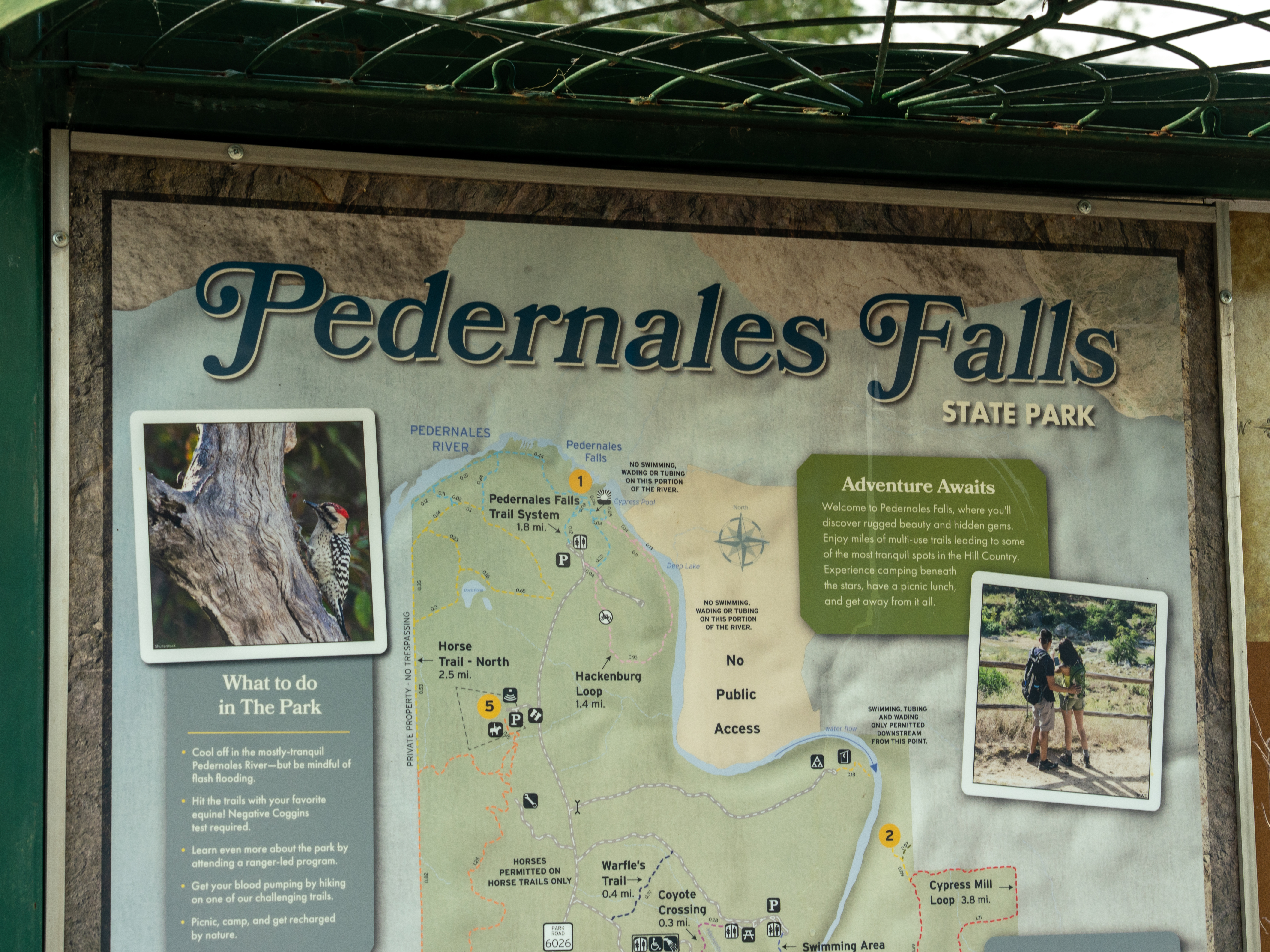 Pedernales Falls State Park trail map and visitor information sign in the Texas Hill Country. Pedernales Falls State Park trail map and visitor information sign in the Texas Hill Country.