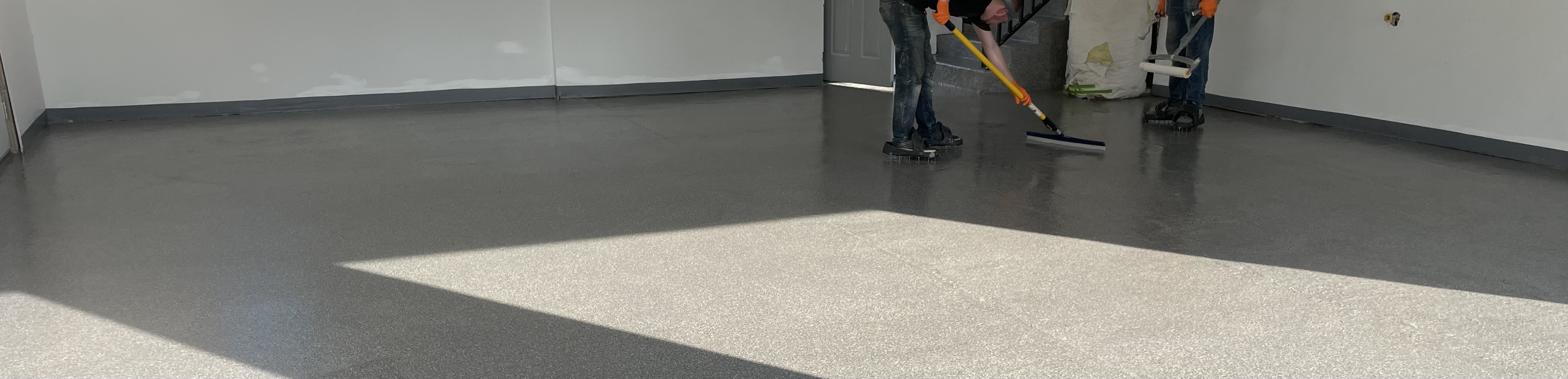 Installer prepping garage