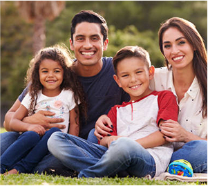 Smiling Family with Two Kids