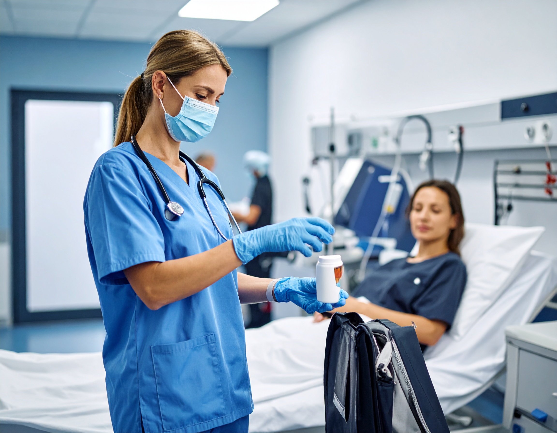 Woman doctor attending to patient