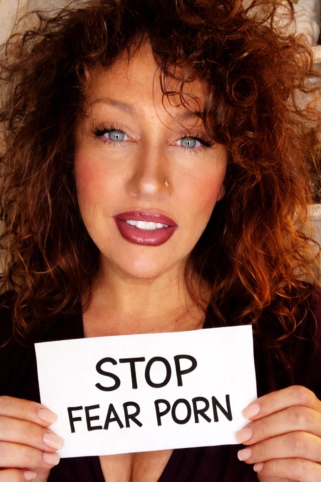 Woman meditating outdoors, reclaiming calm amidst chaos, symbolizing grounding and clarity.
