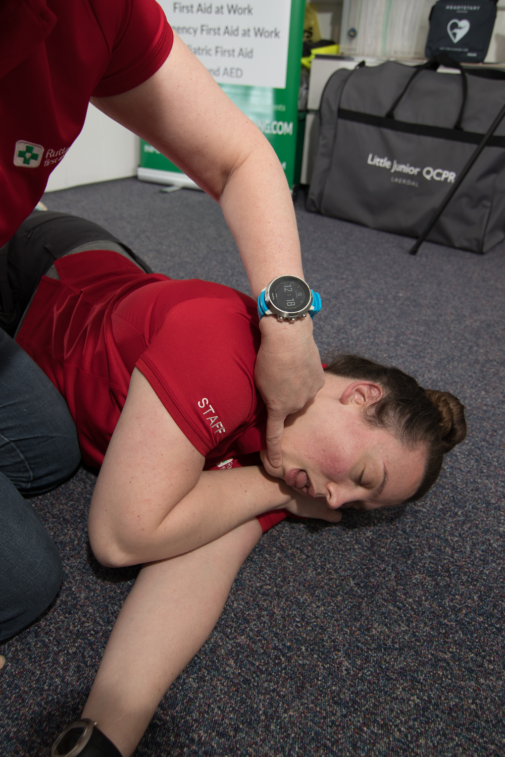 Recovery Position - Rescuer opening airway