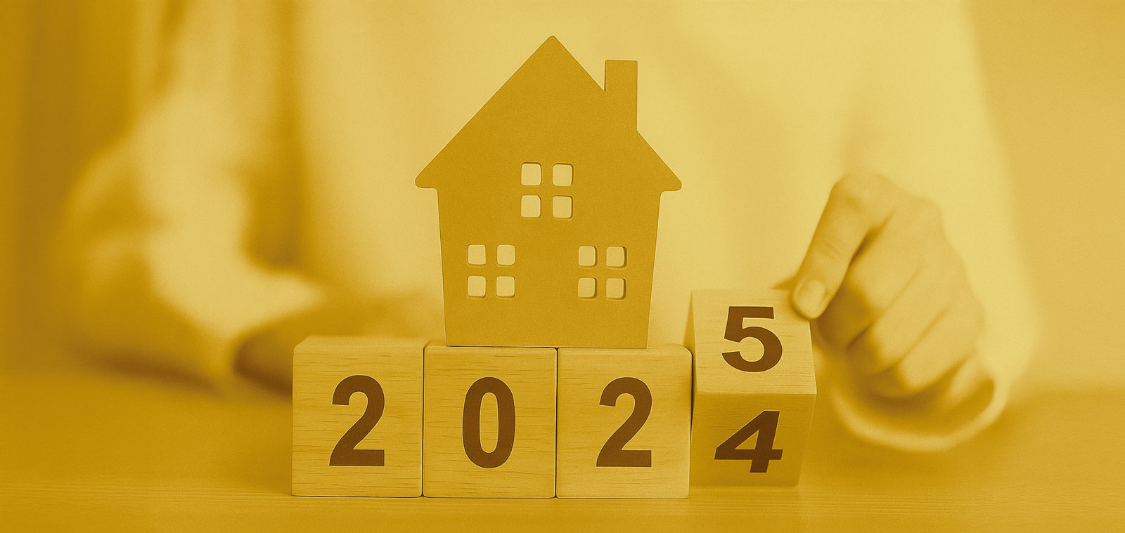 Imagem simbólica da viragem para 2025 no setor imobiliário, com casa em miniatura sobre blocos de madeira. Imagem simbólica da viragem para 2025 no setor imobiliário, com casa em miniatura sobre blocos de madeira.