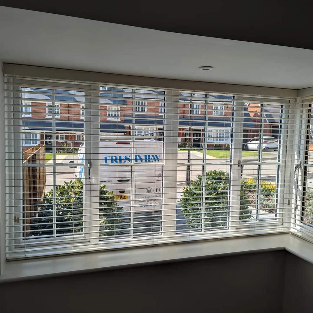 Faux wood venetians in New build
