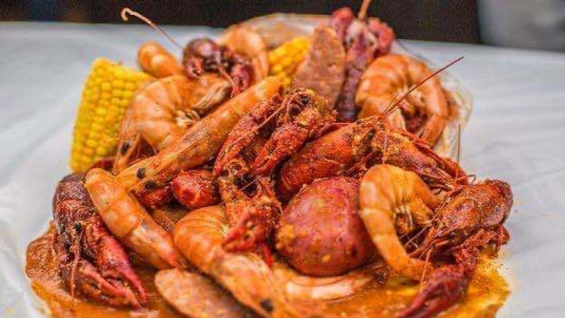 Spicy seafood boil with crawfish, shrimp, corn, and sausage Spicy seafood boil with crawfish, shrimp, corn, and sausage
