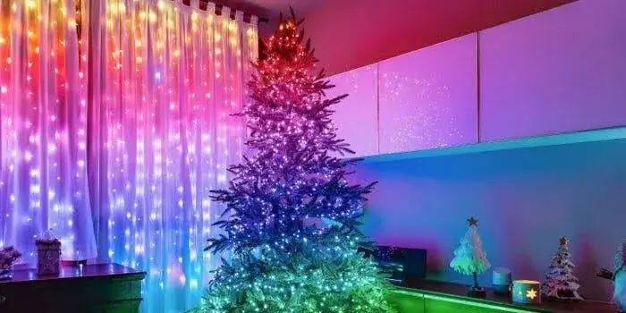A beautifully decorated Christmas tree with colorful lights glowing in a cozy room. A beautifully decorated Christmas tree with colorful lights glowing in a cozy room.