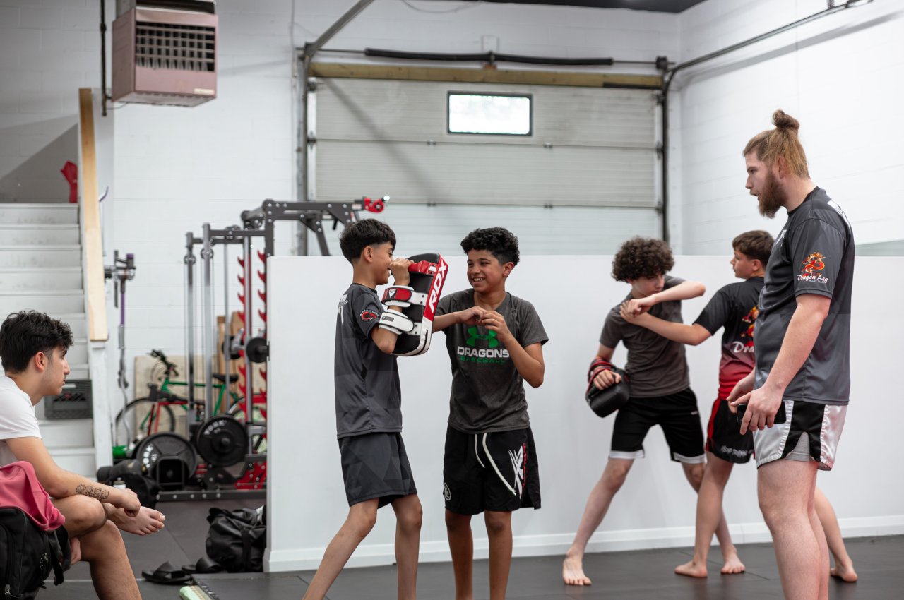 Martial arts instructor with kids