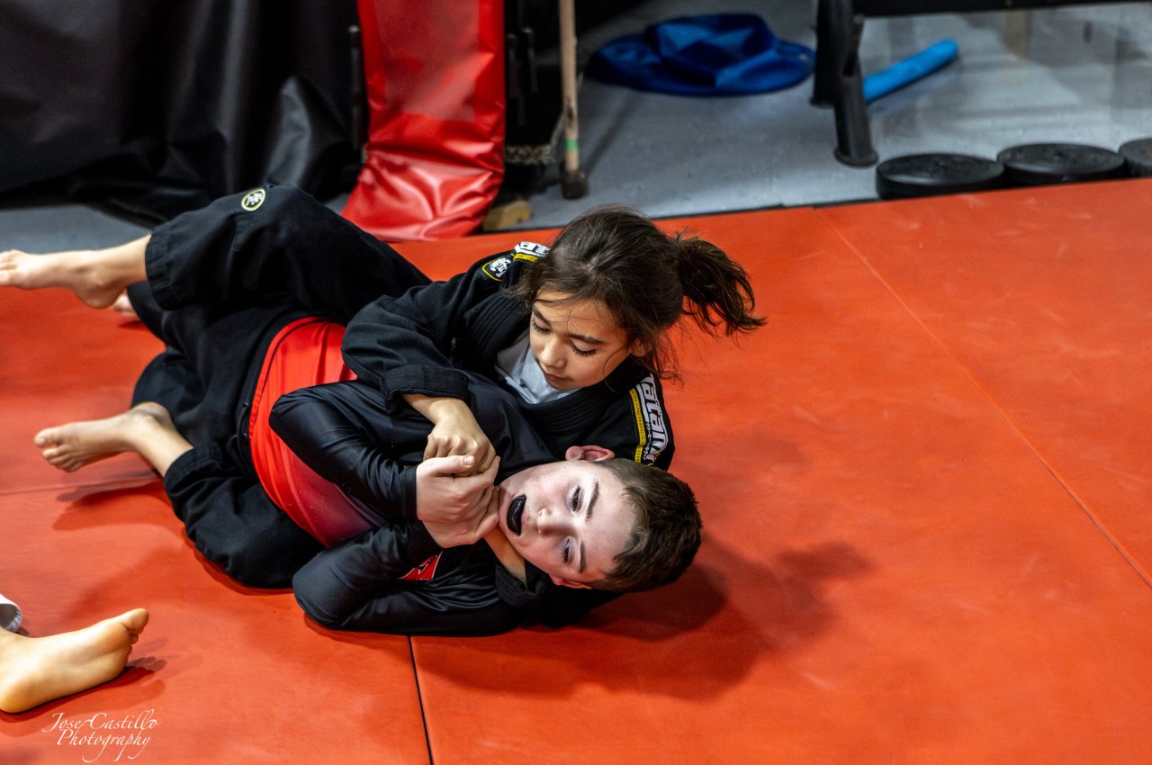 Martial arts instructor with kids