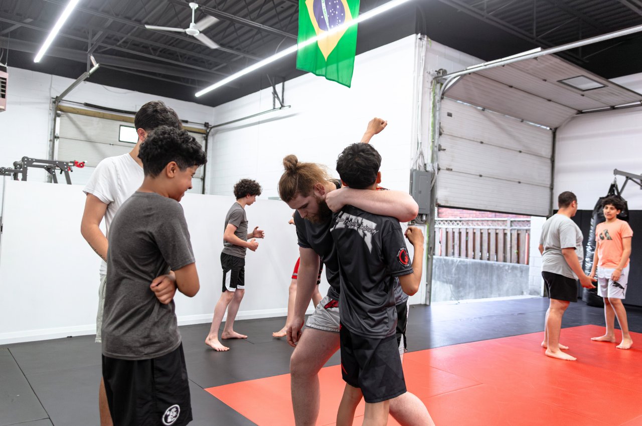 Martial arts instructor with kids