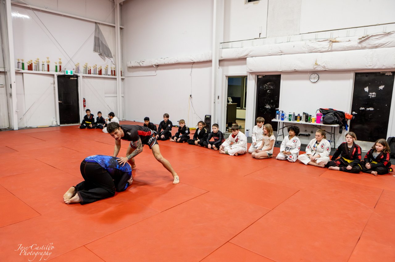 Martial arts instructor with kids
