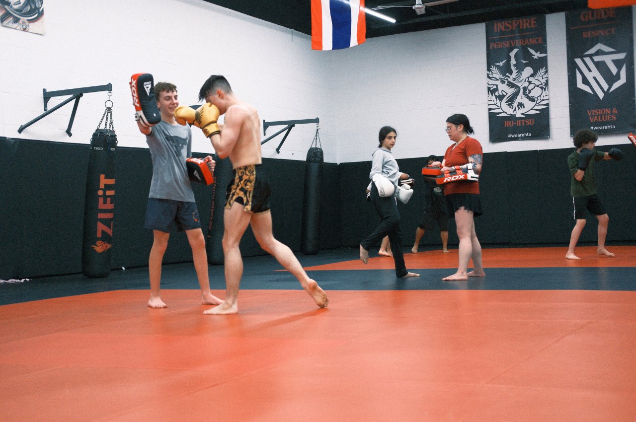 Martial arts instructor with kids