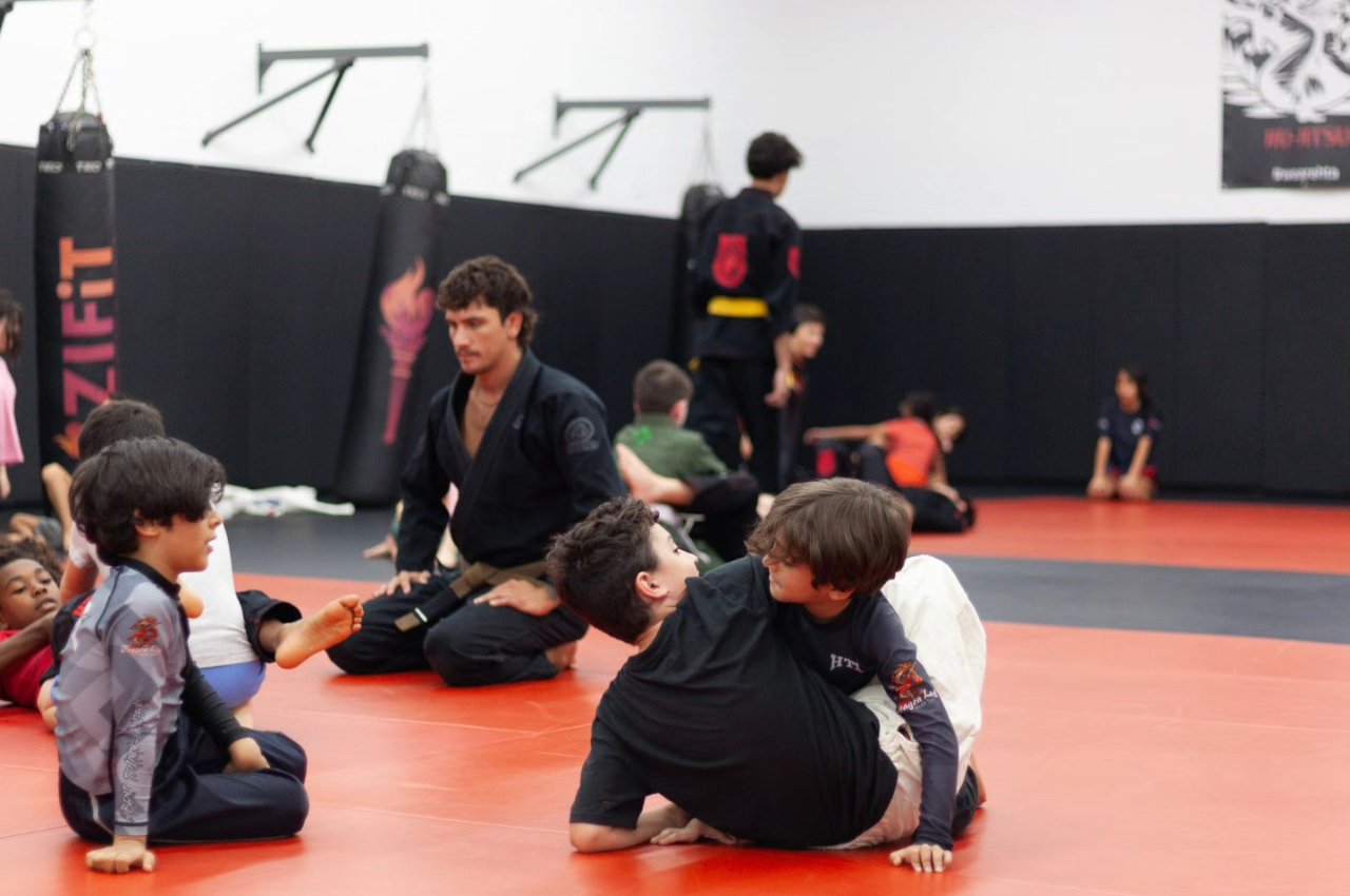 Martial arts instructor with kids
