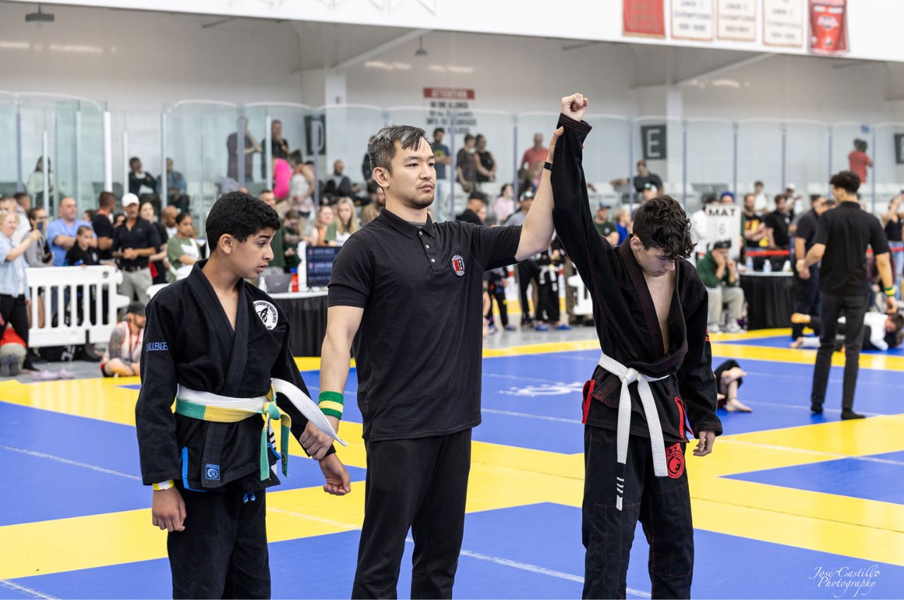 Martial arts instructor with kids