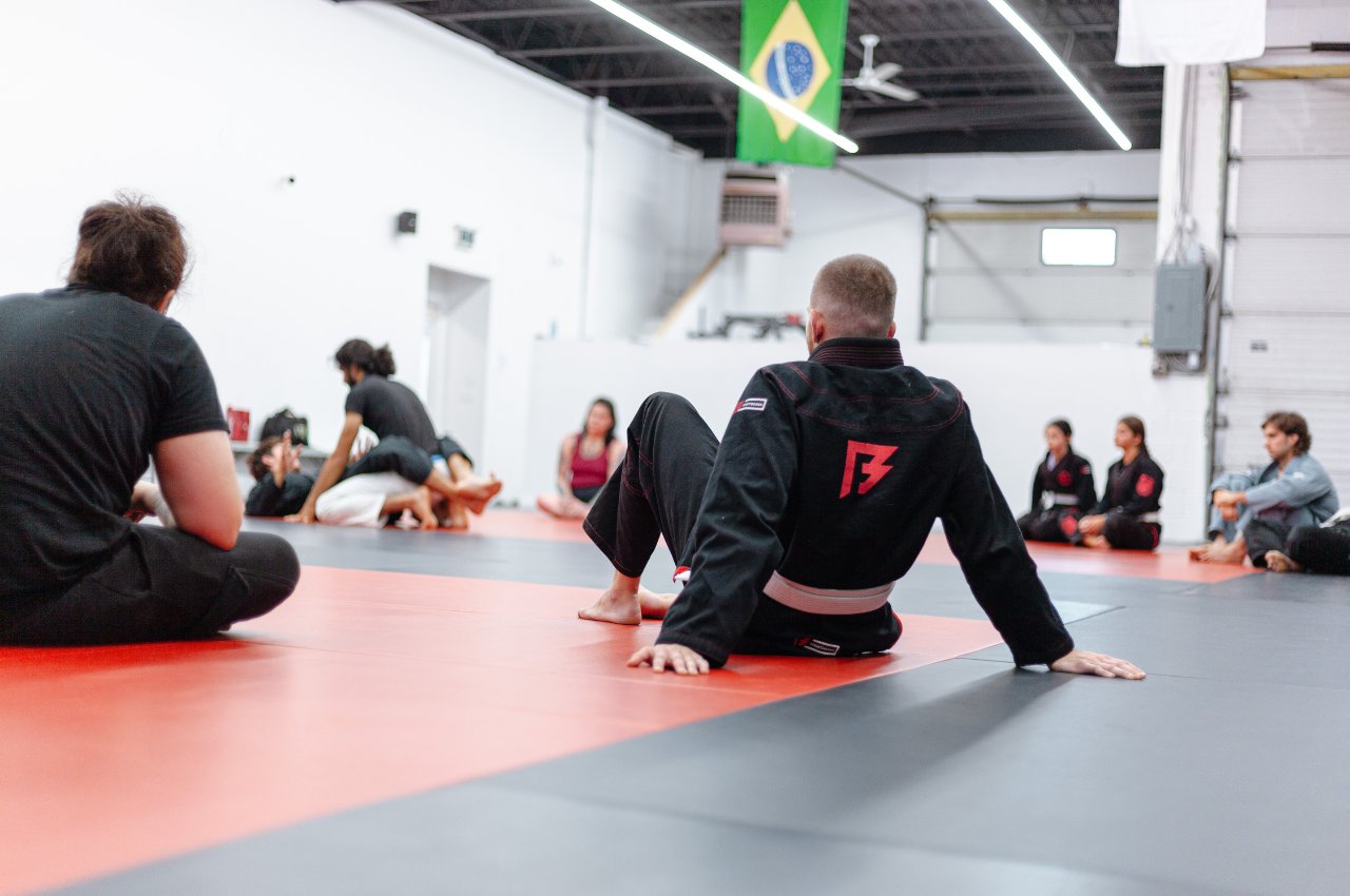 Martial arts instructor with kids