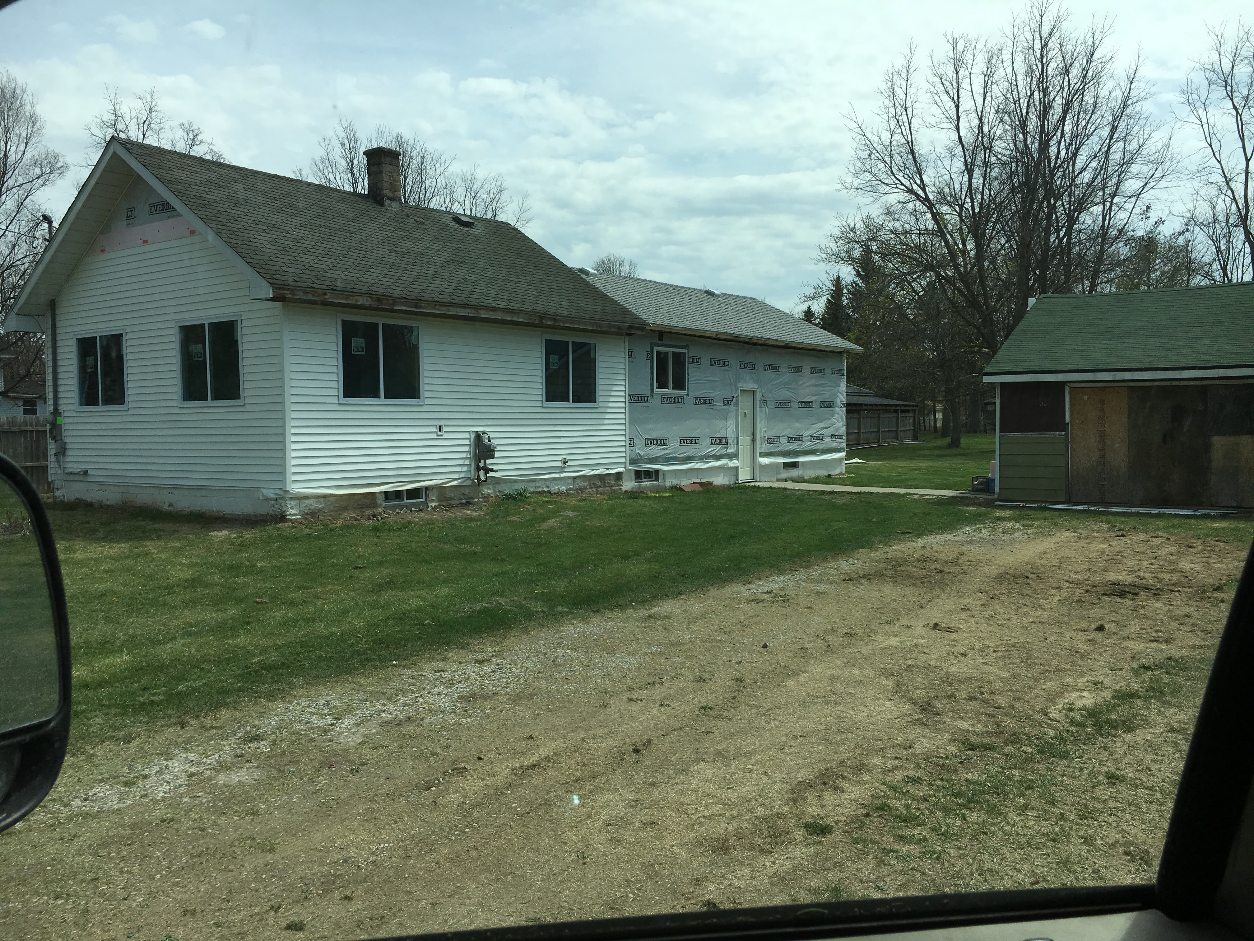 A repaired roof and siding job