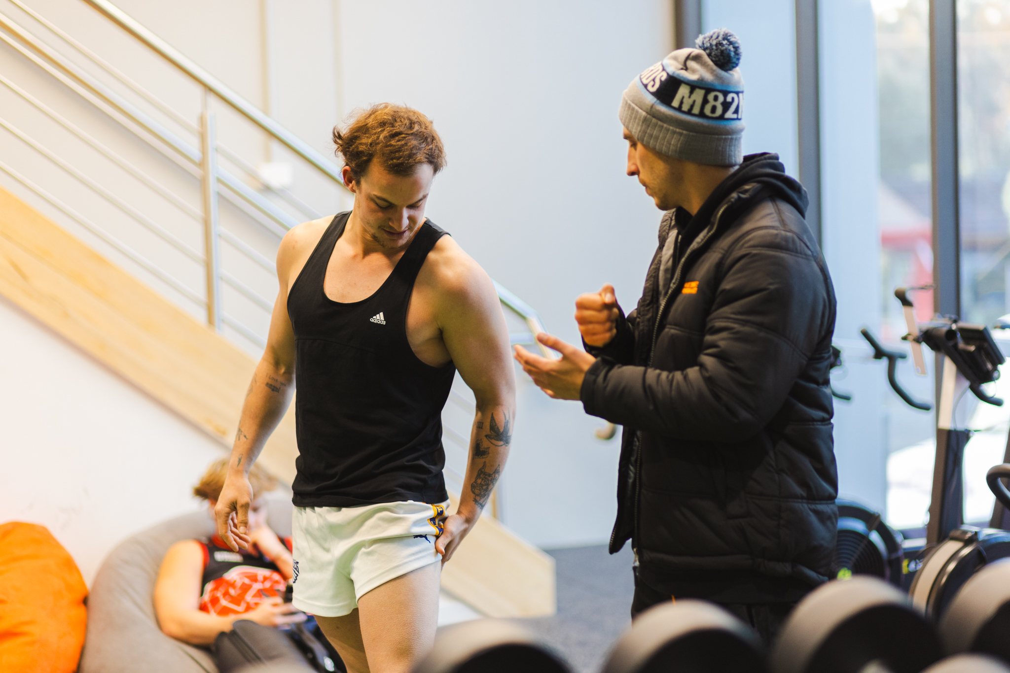 athlete grabbing hamstring niggle physio rehab