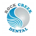 Rock Creek Dental logo with blue waves and silver circle for clinic branding