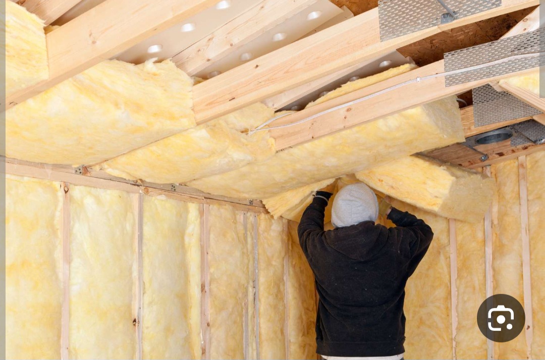 Fiberglass insulation installed by FantaskTeam in an Oklahoma City attic