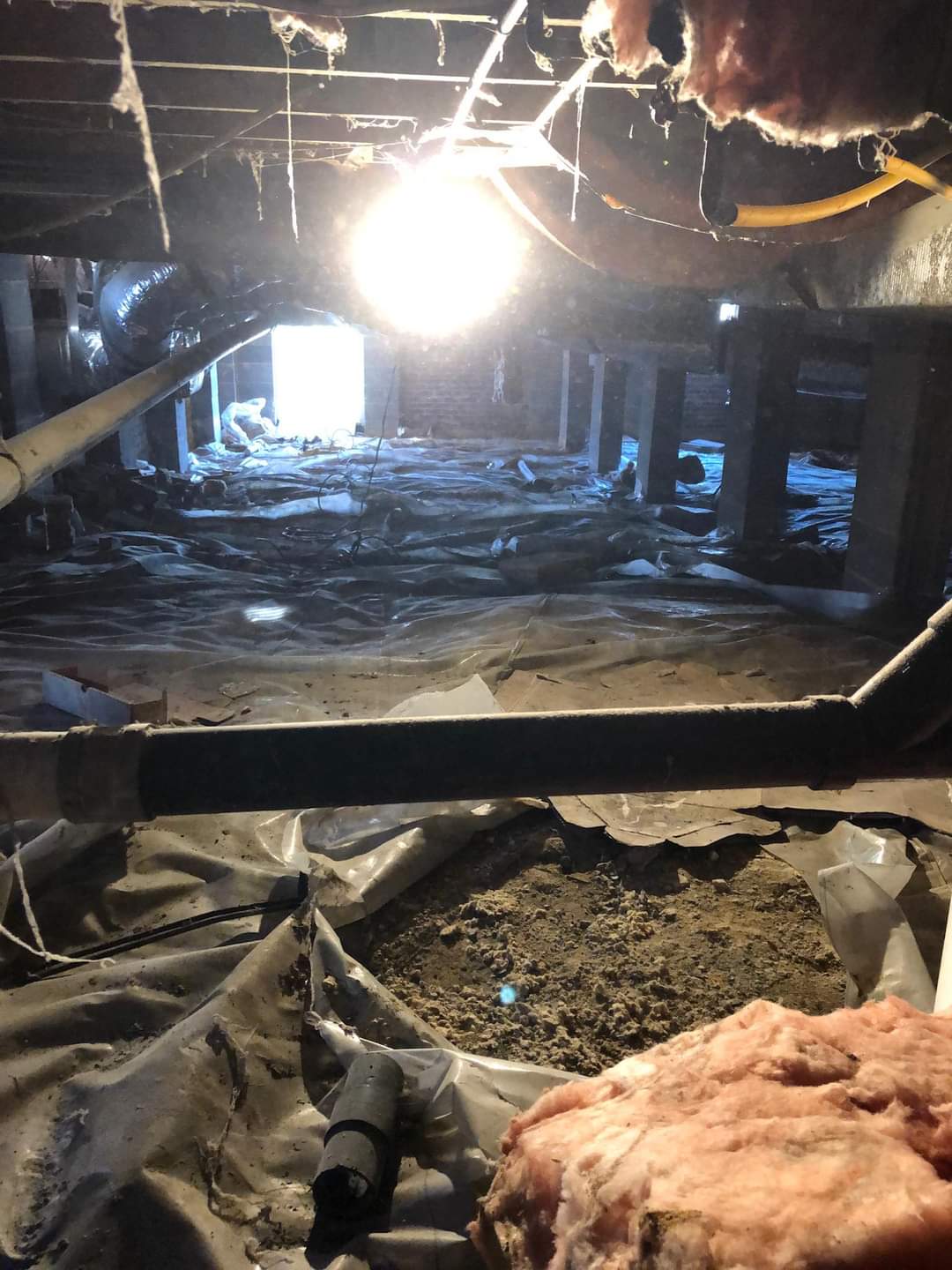 FantaskTeam insulation team adding thermal protection in a Boston, Massachusetts attic