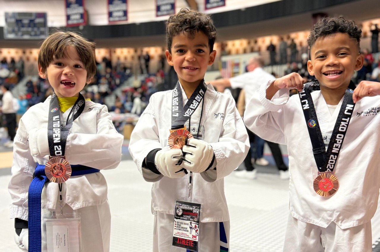 Martial arts instructor with kids