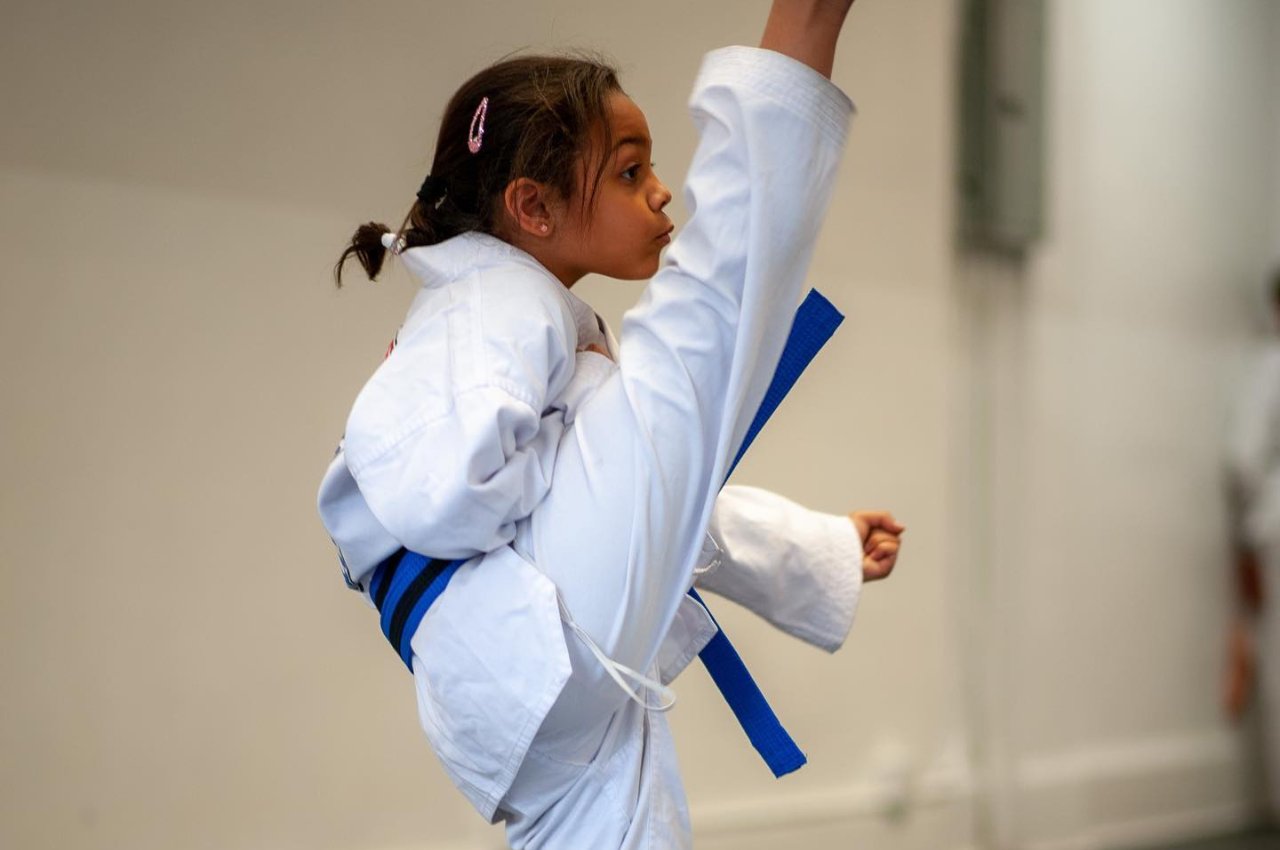 Martial arts instructor with kids