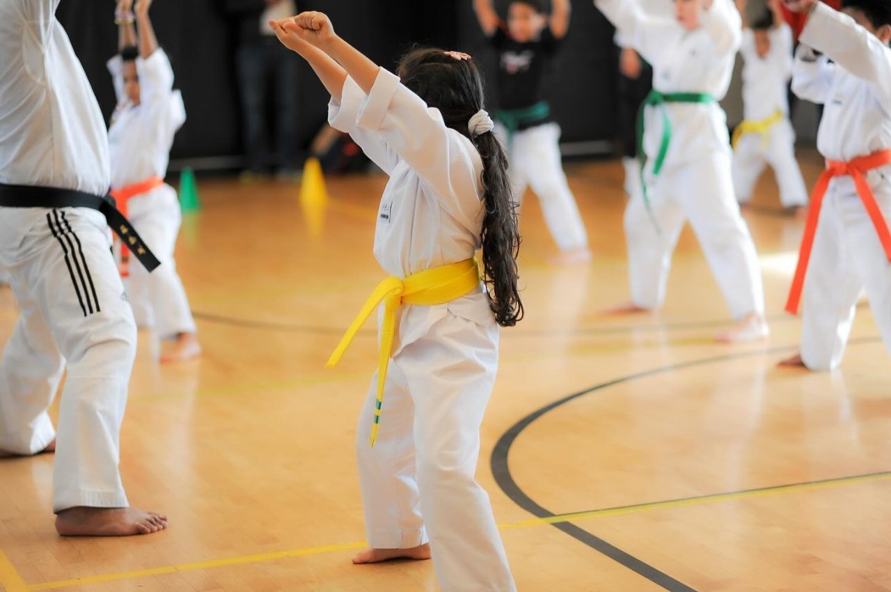 Martial arts instructor with kids