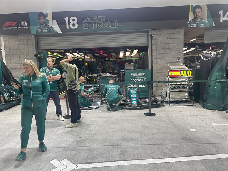 Hassan el Asraoui with the pit crew at formula 1 grand prix