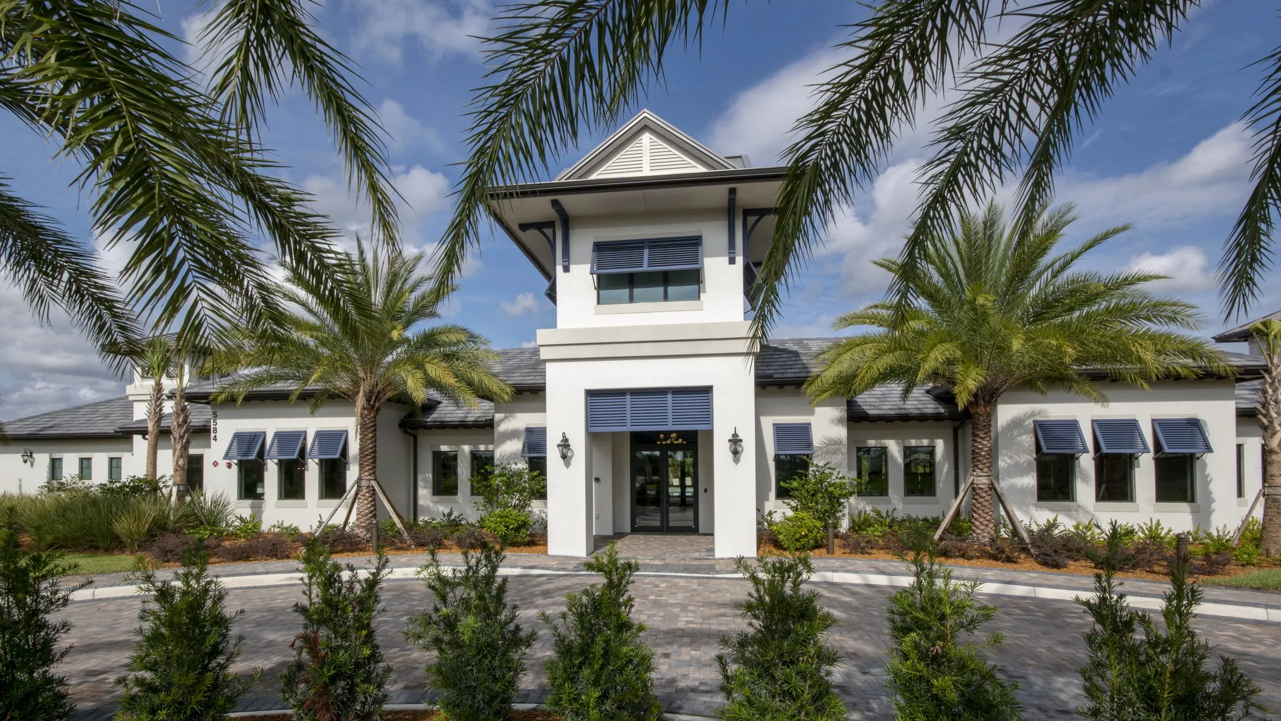 Divosta Pulte Clubhouse Entrance Sunny Sky Building