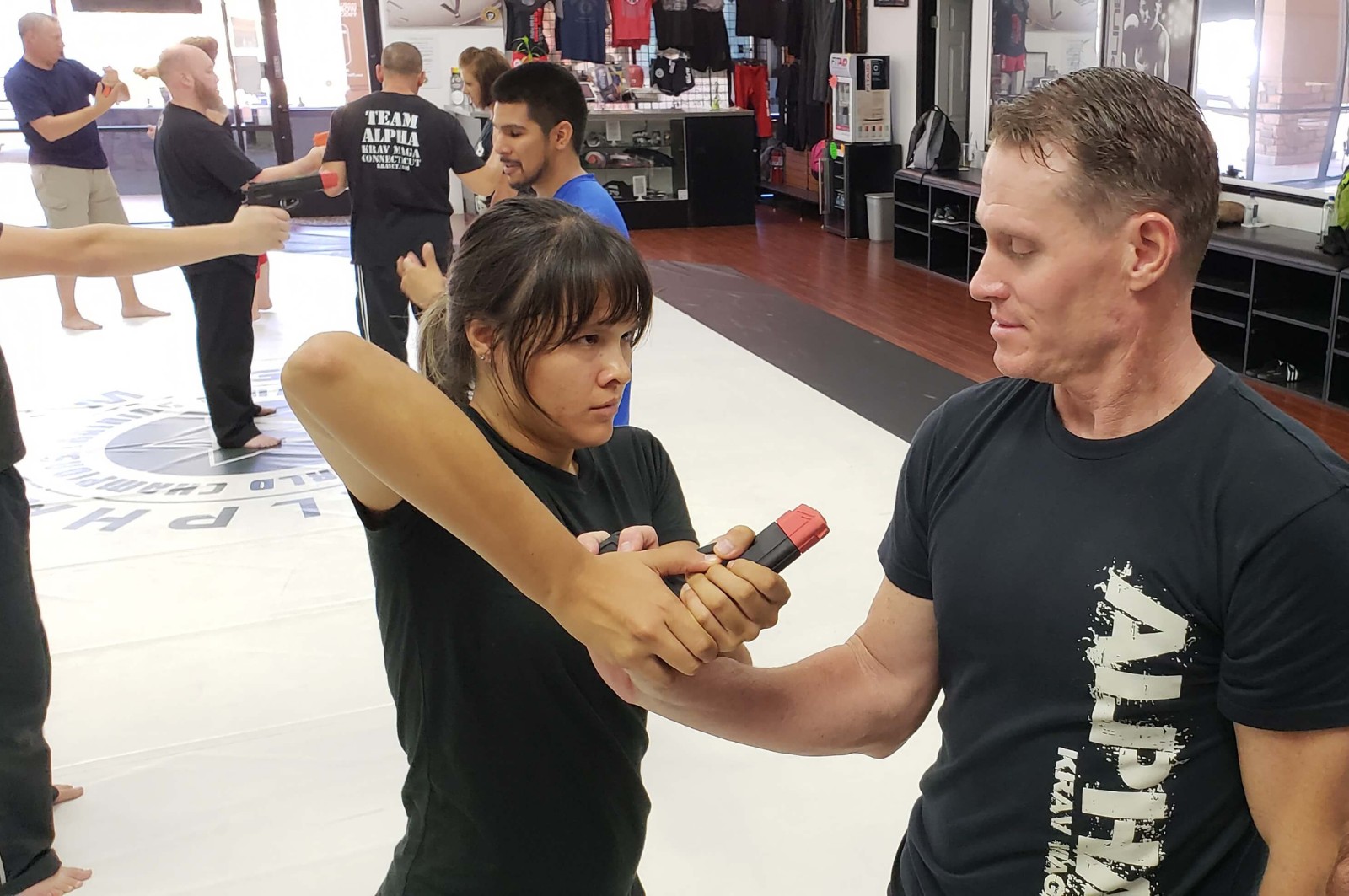 Martial arts instructor with kids
